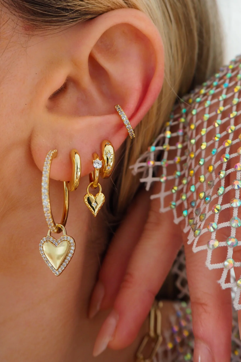 dainty gold heart-shaped charm hoop earrings