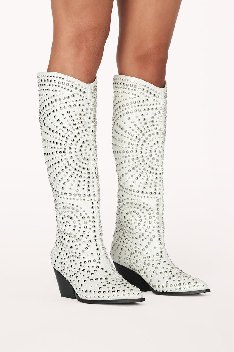 tall knee high cowgirl boots with circle studded pattern 
